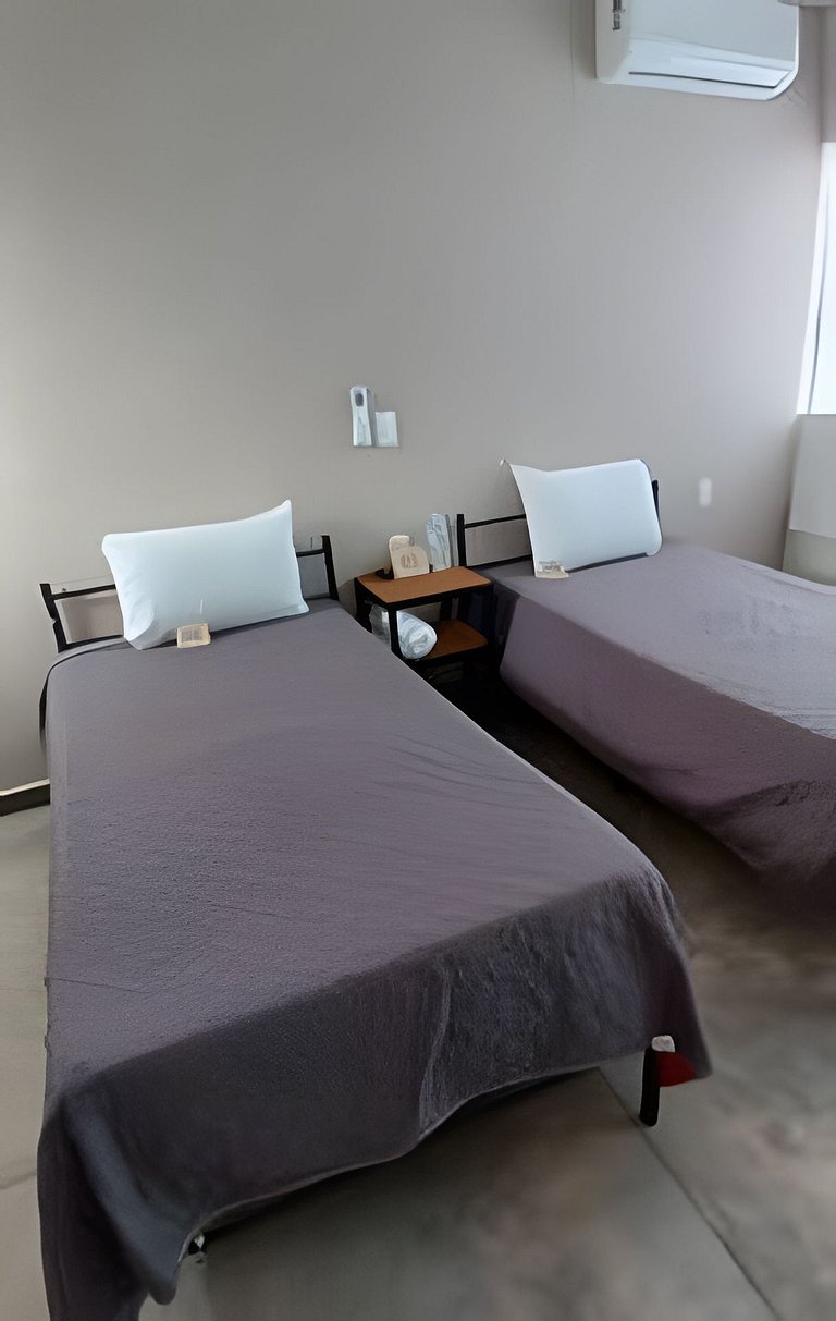 SUITE Begonia, AA, cocineta, baño privado, ubicada