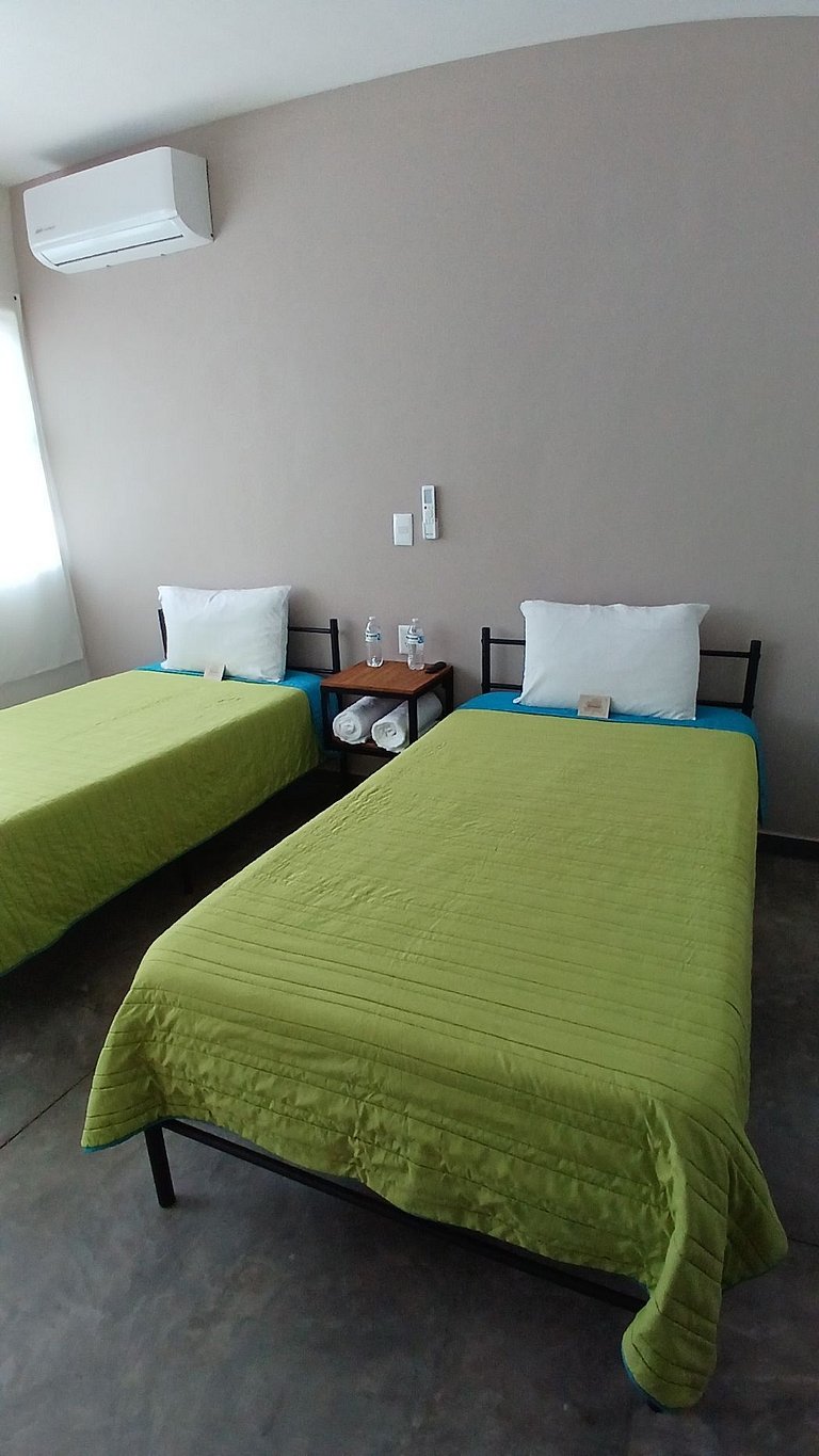 SUITE DALIA, AA, cocineta, baño privado, ubicación