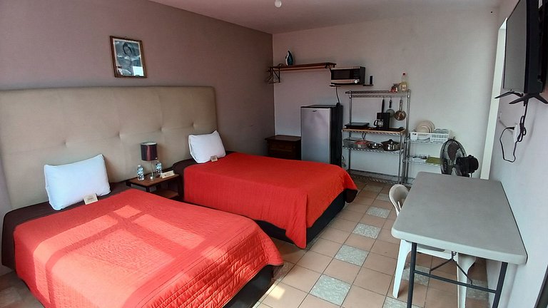 Suite Azalea, cocineta, baño privado, ubicación