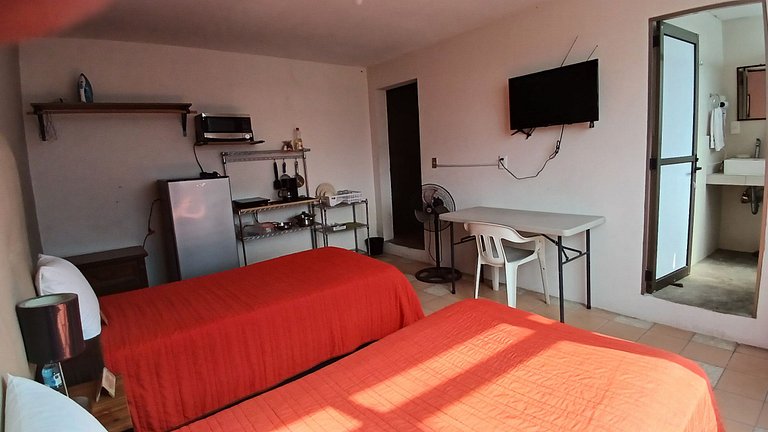 Suite Azalea, cocineta, baño privado, ubicación